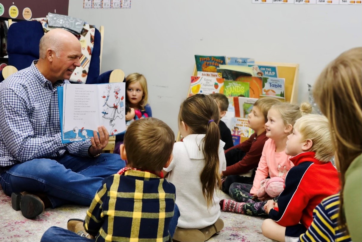 Gov. Gianforte reading to kids at PFL Learning Center in Livingston