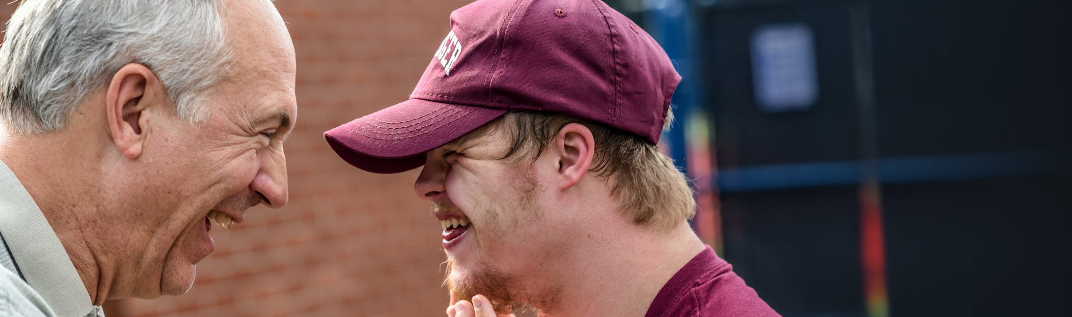 people speaking at tribal meeting 