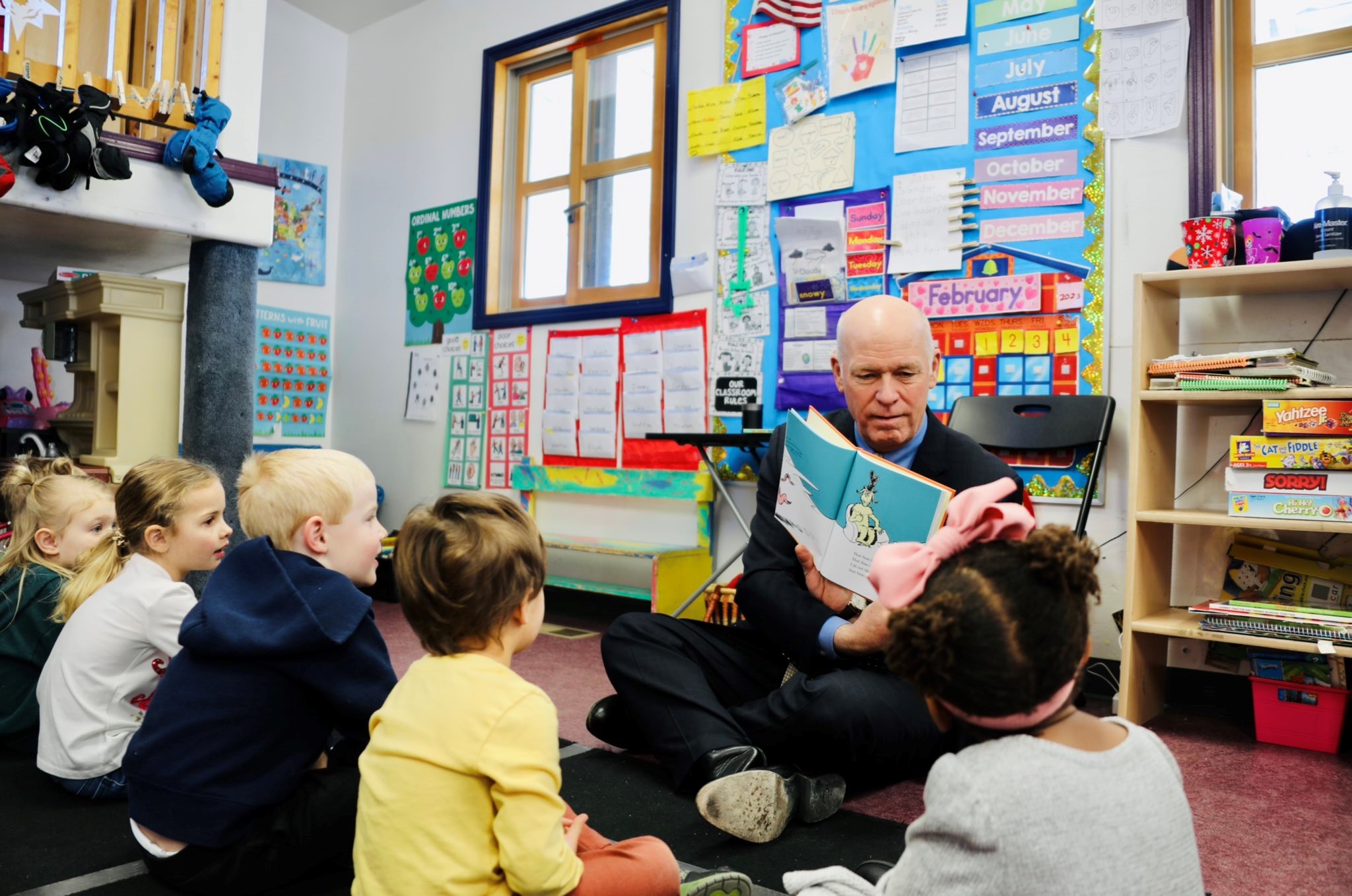 Gov. Gianforte reading to children at a day care center in Helena in 2023